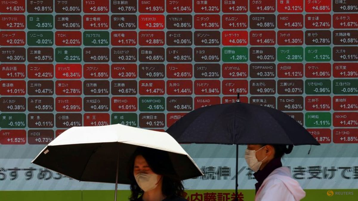 Japan, Taiwan shares set records on tech boost, Fed cut hope