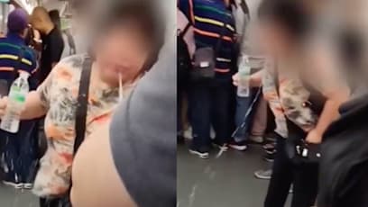 Woman Seen Spitting Water On MRT At Other Commuters; Stops Only After Enraged Passenger Fights Back