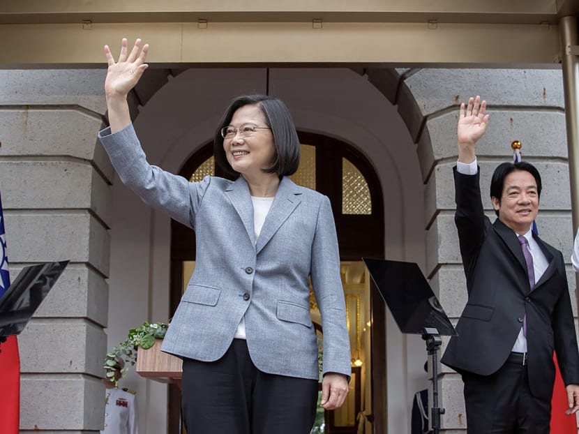 This handout picture taken and released on May 20, 2020 by the Taiwan Presidential office shows Taiwan's President Tsai Ing-wen and Vice-President William Lai waving during an inauguration event for their respective terms in office, at the Taipei Guest House in Taipei.