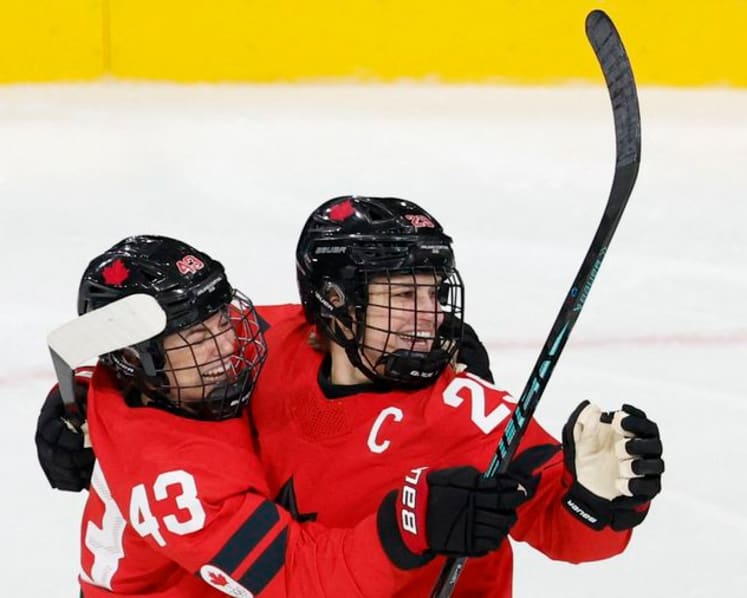 Ice hockey-Too soon to say when captain Poulin will return, says Canada coach