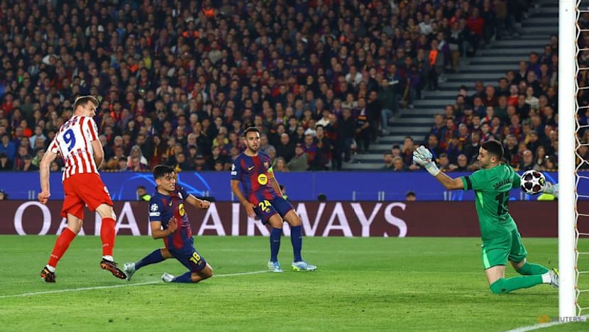 Atletico Madrid storm Camp Nou with 2-0 Champions League win over 10-man Barcelona