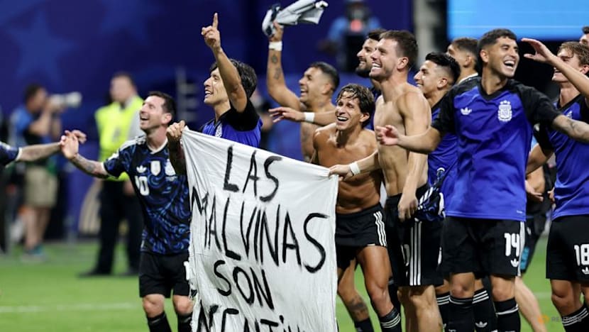 Argentine players brandish political Falklands flag after England match
