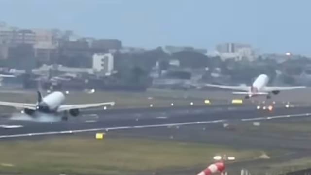 两飞机孟买机场跑道险相撞 空中交通管制员被停职