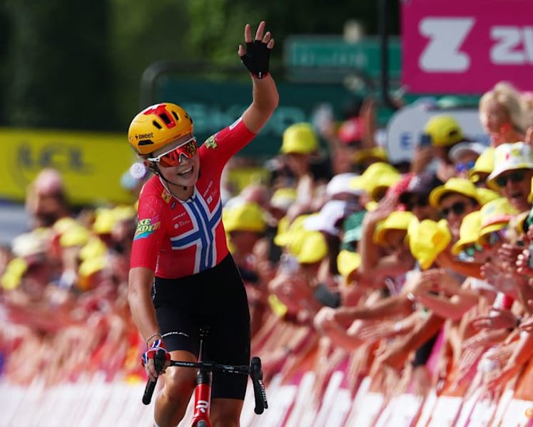 Norwegian Haugset rides to solo victory to take yellow jersey in Tour de France Femmes