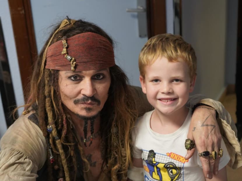 Johnny Depp reprises Captain Jack Sparrow character while visiting patients at Spanish hospital Johnny Depp reprises Captain Jack Sparrow character while visiting patients at Spanish hospital