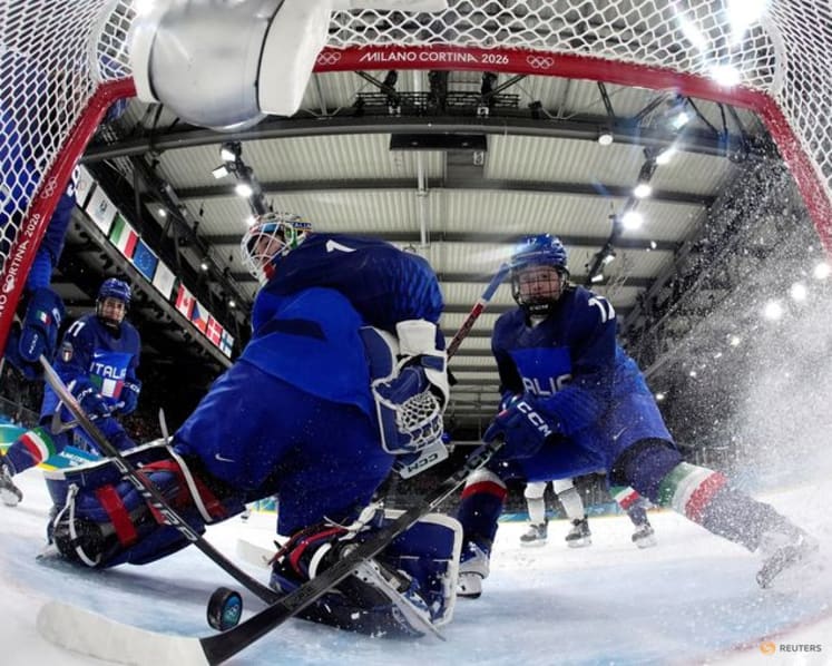 Ice hockey-Italy reach quarters, US and Canada stay unbeaten, Germany beat France in overtime