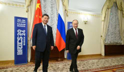 Putin trip aims to show China ties unshakeable after Trump's grand welcome