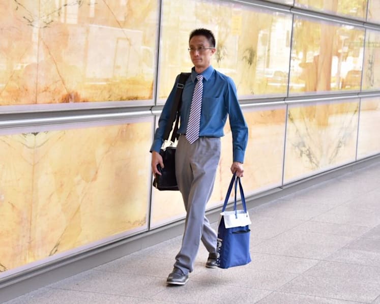 Ex-doctor in HIV data leak given more jail time for failing to give urine sample, breaching OSA