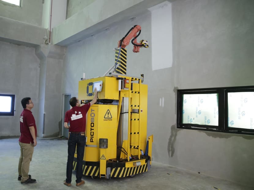 NTU scientists create robot that paints walls quicker, improves safety