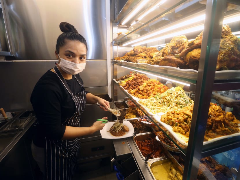 Ms Filzah Miranti Mohd Dawood at the Gerai Nenek Obek stall at Geylang Serai market, which serves authentic Malay dishes, on Jan 10, 2021.