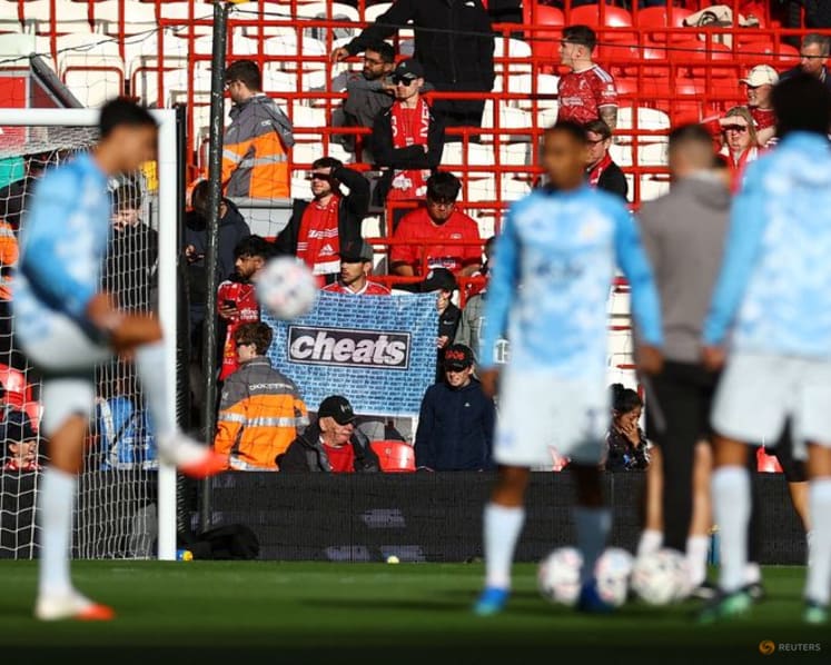 Manchester City met at Anfield with boos and 'cheat' taunts