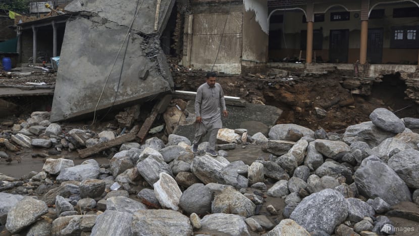 Pakistan rescuers recover bodies after monsoon rains kill over 340