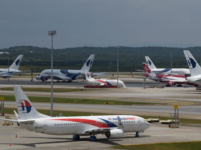 Malaysia Airlines aircraft are parked on the tarmac at Kuala Lumpur International Airport in Sepang on Sept 7, 2020,