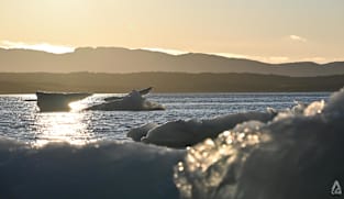 IN FOCUS: Greenland’s melting ice carries warnings far beyond the Arctic
