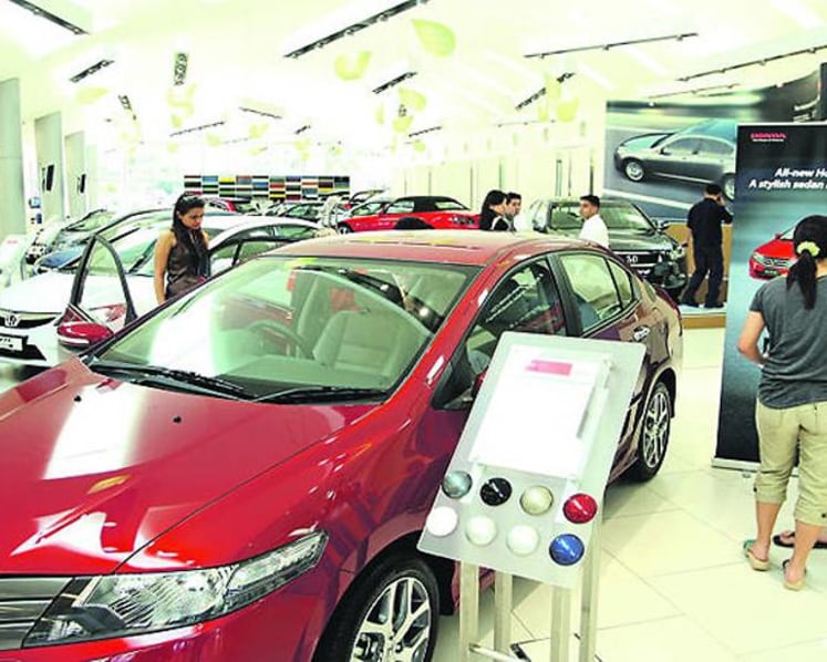 Commentary: Giving up petrol cars is a lot more difficult for parents