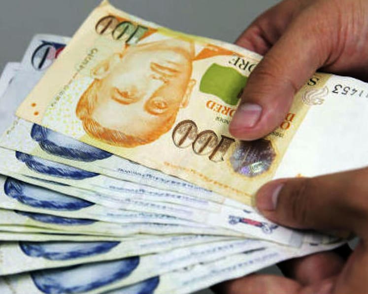 Jail for clinic assistant who took more than S$100,000, aided by co-worker, to support family