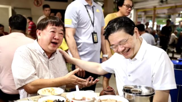 黄总理到访裕华熟食中心  食客笑谢：有CDC券才有鱼吃