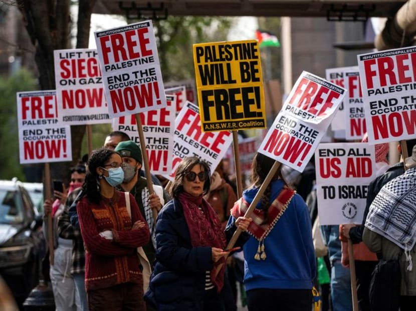 People demonstrate outside Columbia University, during the ongoing conflict between Israel and the Palestinian Islamist group Hamas, in New York City, US, April 23, 2024. People demonstrate outside Columbia University, during the ongoing conflict between Israel and the Palestinian Islamist group Hamas, in New York City, US, April 23, 2024.