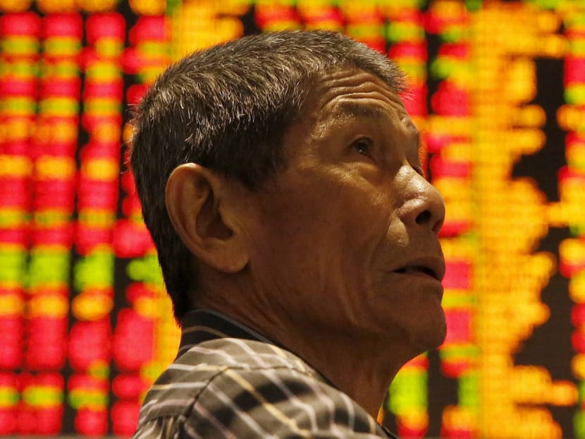 An investor monitoring share market prices in Kuala Lumpur, Malaysia. Today, Asia has a stronger economic outlook. Its developing economies grew 6.8 per cent yearly in the past two decades, faster than any other region. Photo: Reuters