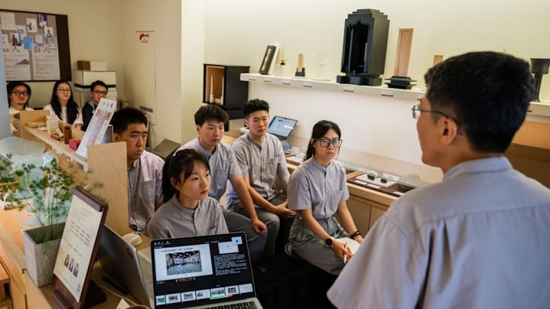 Why these young Chinese chose to work with the dead