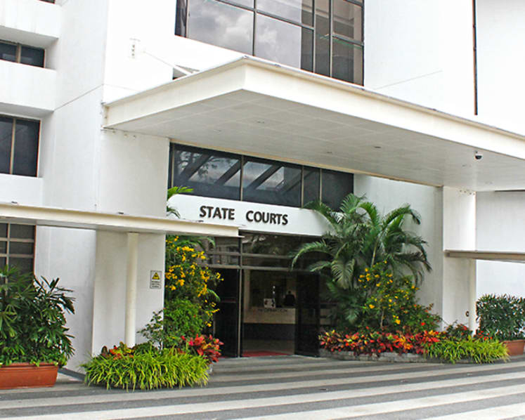 Man jailed for spitting at prisons officer in court 