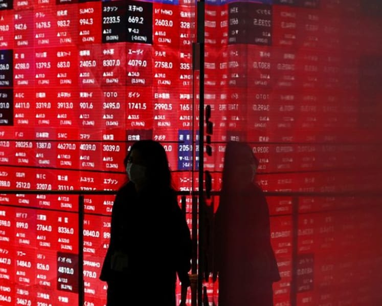 US stocks close below record highs, world indexes set for double-digit 2025 gains