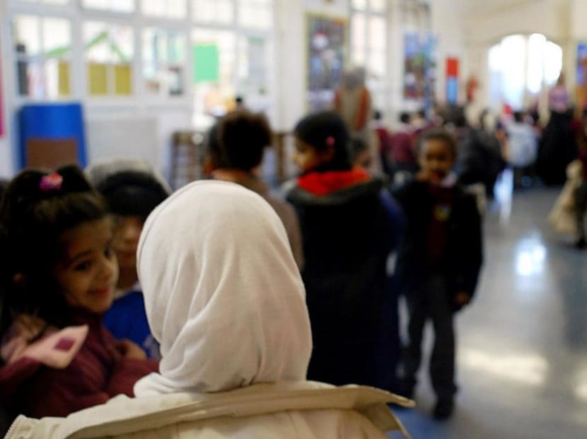 A woman wearing a hijab. AFP file photo