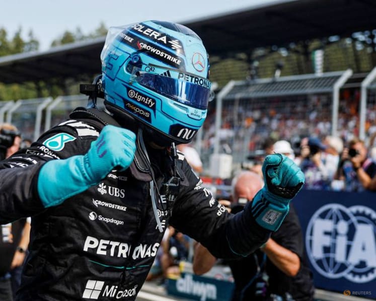 Russell ends long wait with 'cold-blooded' win