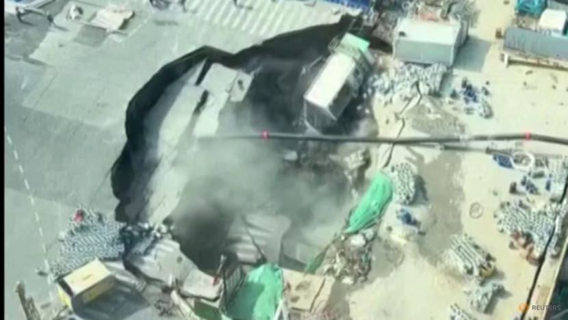 Massive sinkhole swallows road, part of construction site near downtown Shanghai