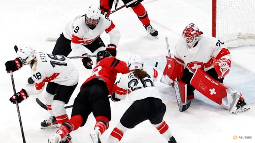Ice hockey-Canada look to captain Poulin in title defence after goal-scoring record