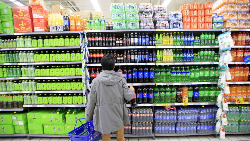 Soft drink companies urged by Singapore Govt to cut sugar content