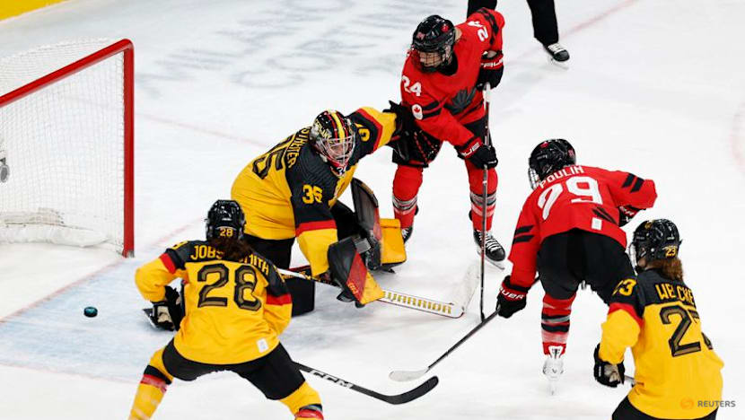 Ice hockey-Canada into semis, with Poulin back from injury and equalling scoring record
