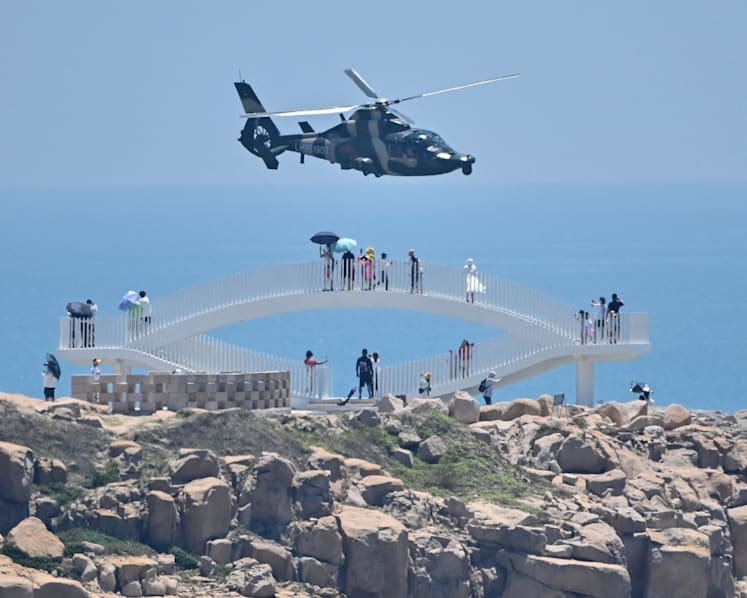 In pictures: Scenes from both sides of the Taiwan Strait as China conducts unprecedented military exercises
