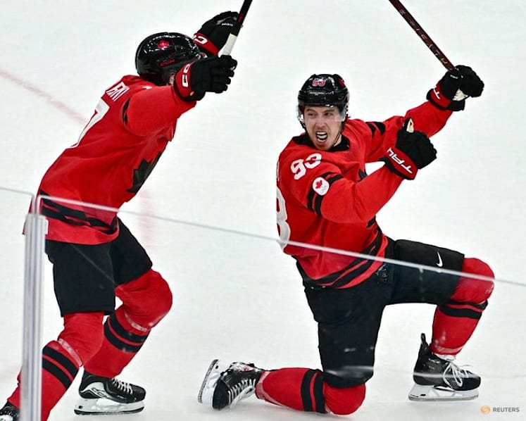 Ice hockey-'Go get it, boys': Injured Crosby's pep talk powers Canada quarter-final comeback
