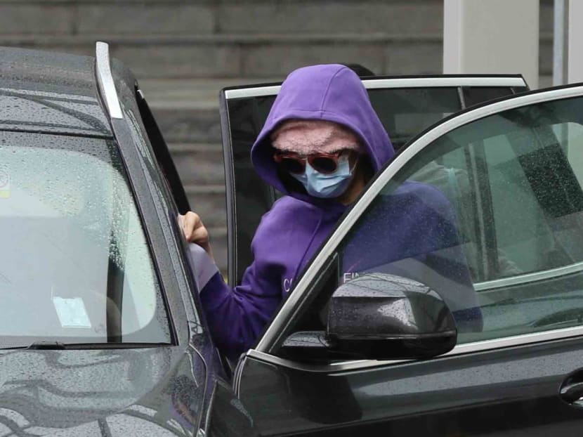 Tan Lee Hoon about to leave the State Courts in a BMW car on Dec 9, 2022. Tan was granted bail pending her sentencing scheduled for Jan 12, 2023.