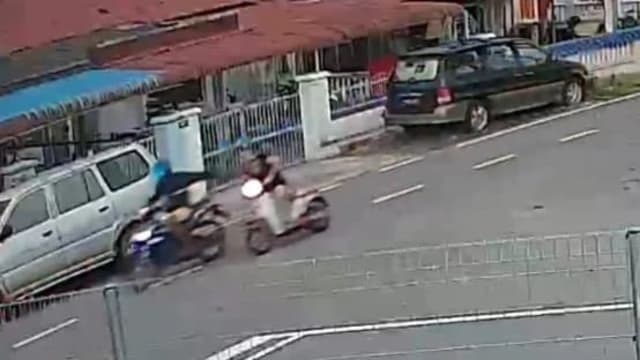 柔佛妇女遭歹徒一路跟踪 从后抢包包跌倒全身伤