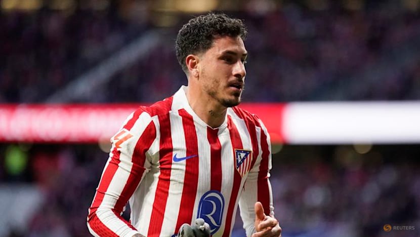 Gimenez swoops in after pigeon pauses Atletico match