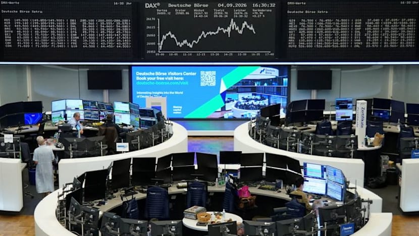 Nasdaq sets record high on AI optimism, oil drops below $100