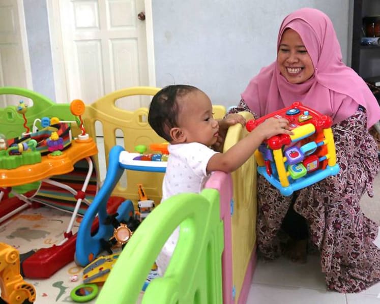A journey of reward and regret: Yishun mum who fostered 5 kids, helps needy students
