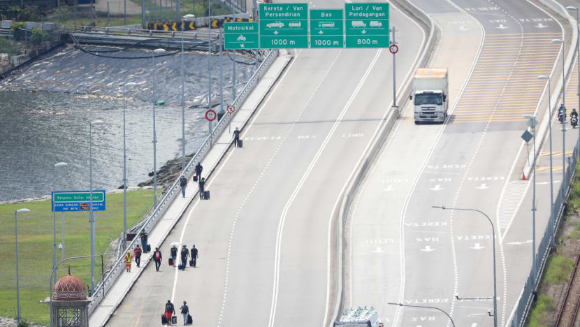 Malaysia looking to fully reopen borders with Singapore in January: Report