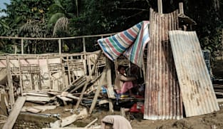 Indonesia president expects flood-stricken Sumatra to return to normal in 2-3 months as death toll exceeds 1,000