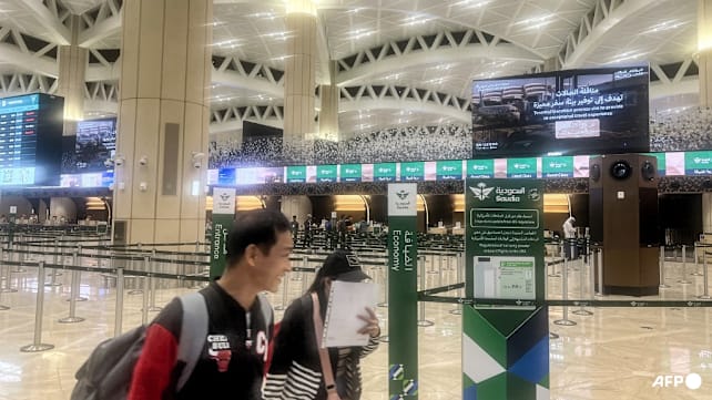 Singaporeans stranded by Middle East airspace shutdown face delays, rising costs