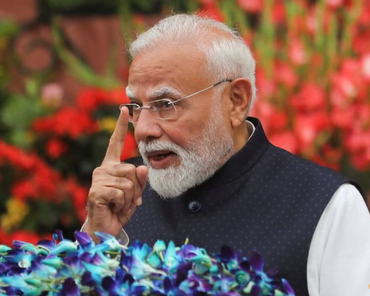India PM Modi announces panel to overhaul exam system after protests