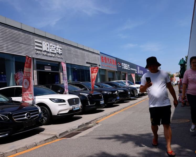 China to tighten oversight on new cars exported as used vehicles