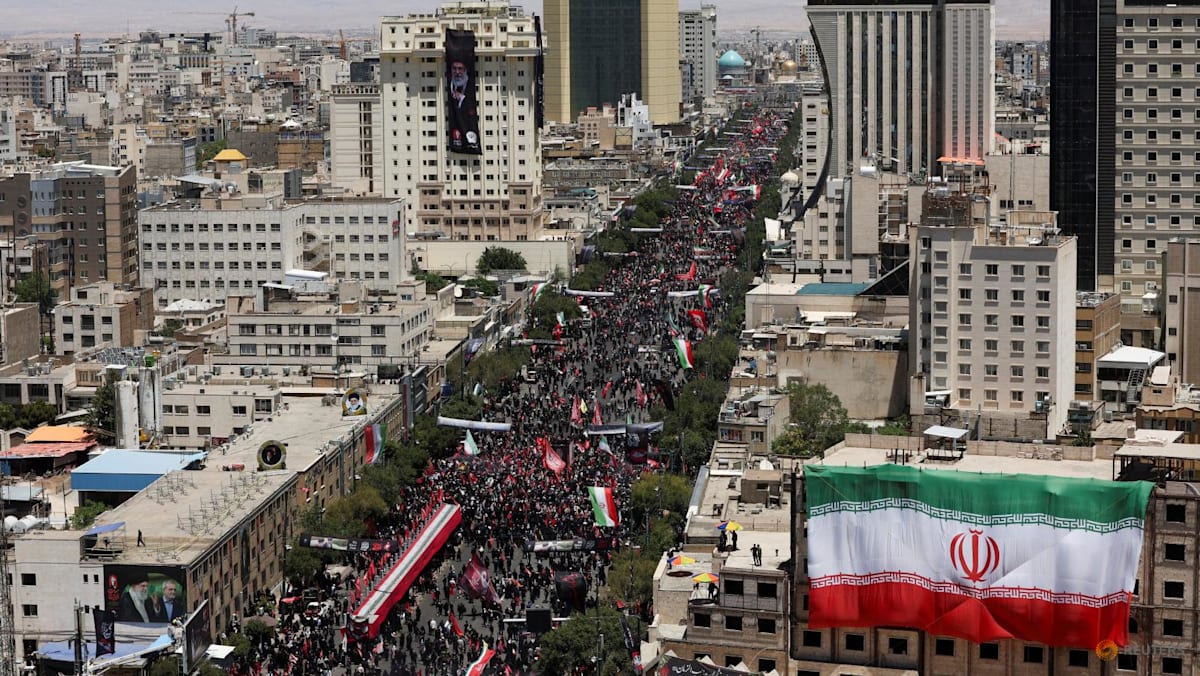 Iran says it hits US military targets in Gulf, prepares to bury slain leader