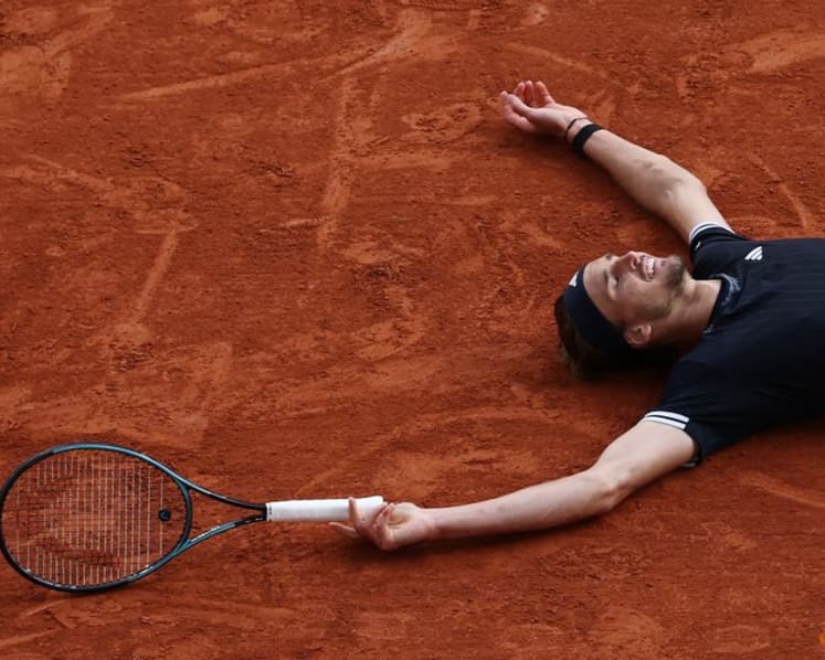 Zverev tears down the wall to enter Grand Slam winners' circle at French Open