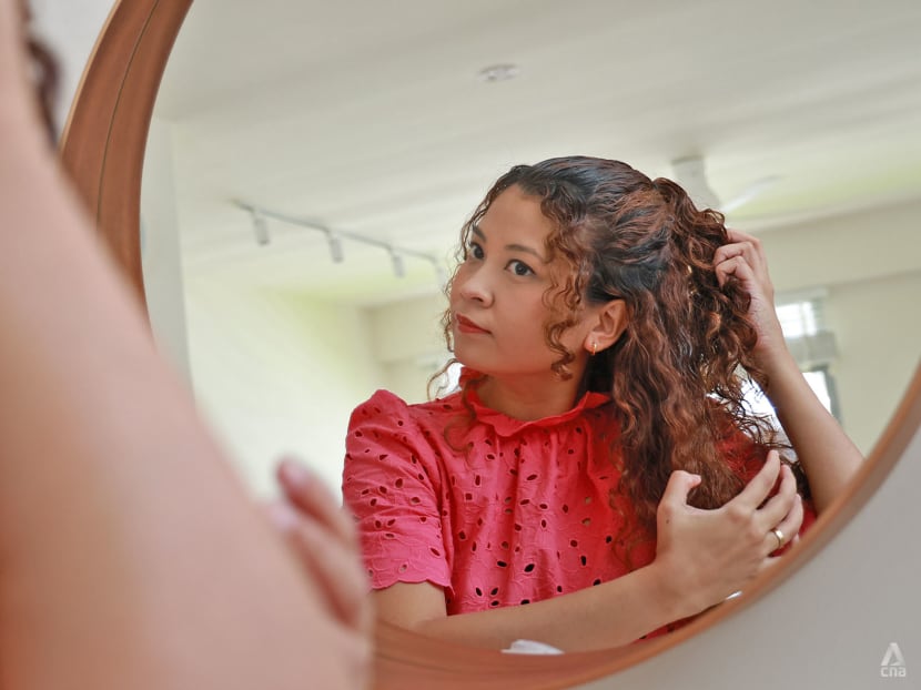 I was insecure about my curly hair all my life. Now in my 30s, I'm finally embracing it