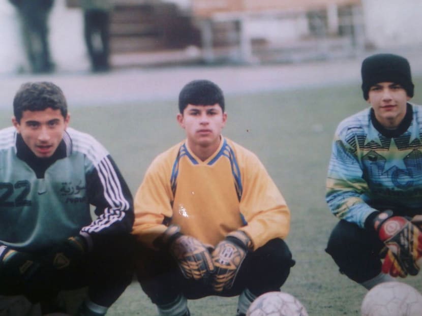In this undated image taken from a photo provided by Nosheen Hanaan, Hanaan, left, poses with teammates from the Syrian national youth team. Photo: AP