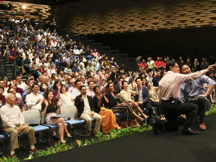 DPM Heng, seen here taking a wefie at Saturday's dialogue, said the Our Singapore Conversation project led to major policies such as the Pioneer Generation Package, MediShield Life and changes to the PSLE scoring system. DPM Heng, seen here taking a wefie at Saturday's dialogue, said the Our Singapore Conversation project led to major policies such as the Pioneer Generation Package, MediShield Life and changes to the PSLE scoring system.
