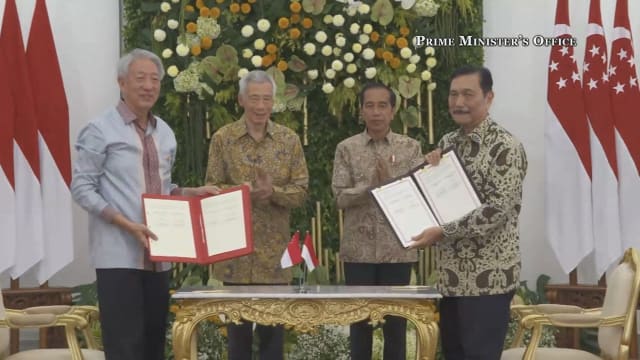 我国同印尼签署两项合作备忘录